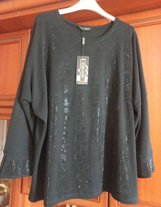 Нарядна трикотажна кофтина.