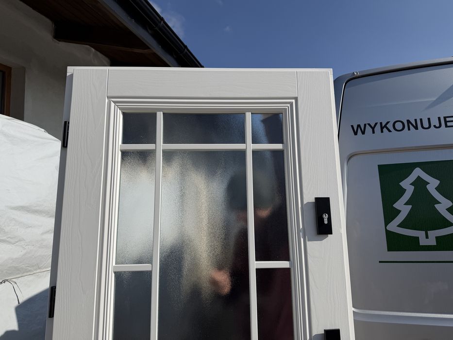 Drzwi drewniane zewnętrzne-wewnątrzklatkowe białe Cała Polska