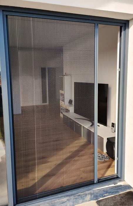 Moskitiery okienne,drzwiowe,plisowane,rolowane,przesuwne