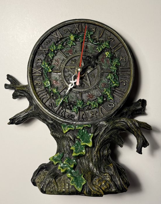 Relógio Druída de pousar em móvel