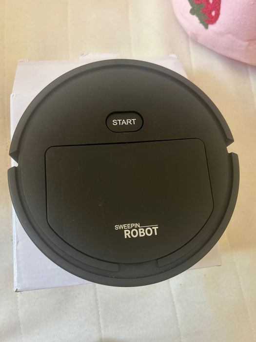 Mini robo aspirador