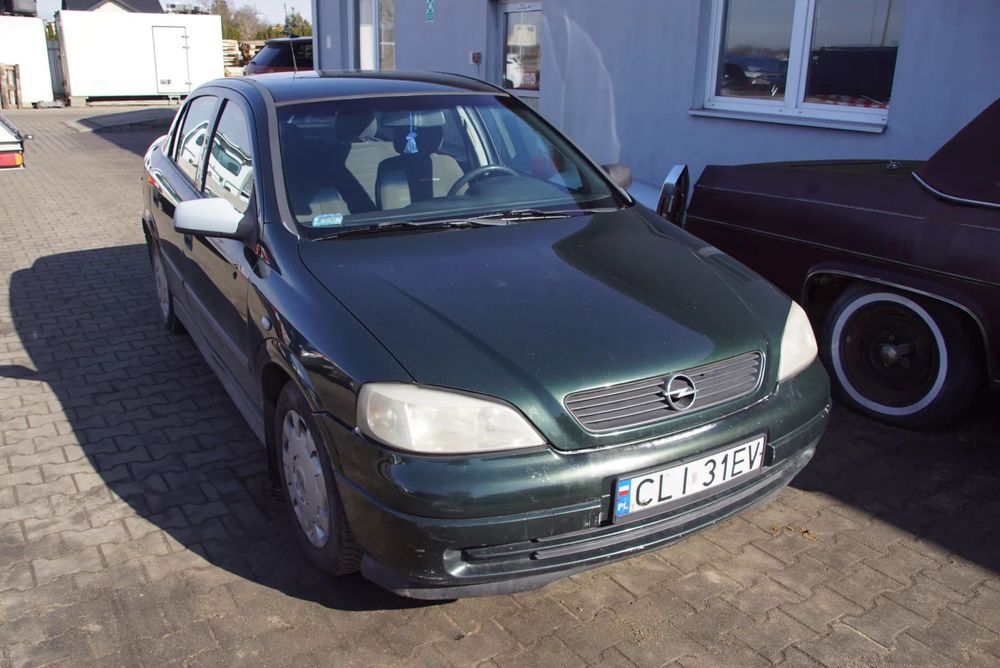 Auto na części - Opel Astra G II 1.6 8V 84 KM Z16SE F13 42U 2001R Silnik Skrzynia Drzwi Maska Zderzak Błotnik Klapa Lusterko Lampa Klamka Szyba Deska Kokpit Sterownik Moduł Czujnik Licznik Panel Kierownica