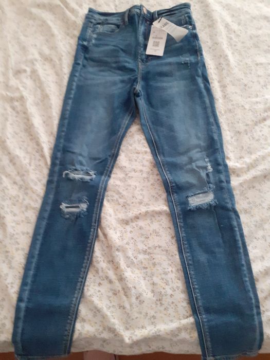 Calças de ganga novas