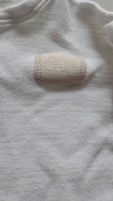 Pajacyk śpioszek piżamka niemowlęcy paski paseczki łapki St. Bernard