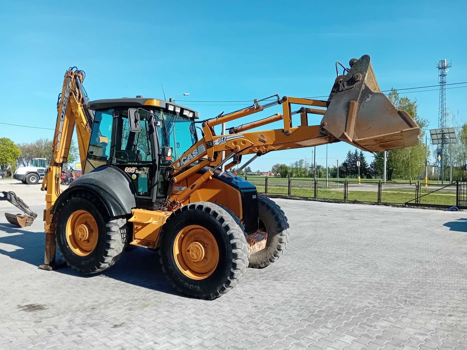 Koparko-ładowarka Case 695 Super R powershift opony 50%  Jcb brutto yoistick klima