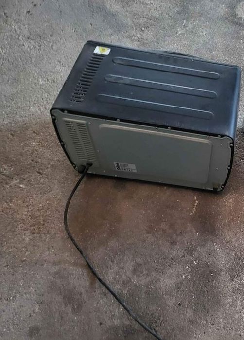 Forno eletrico a funcionar