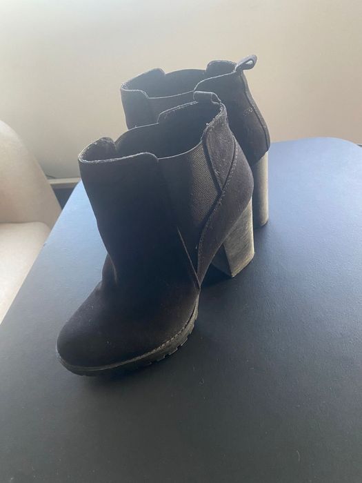 Botas pretas salto alto