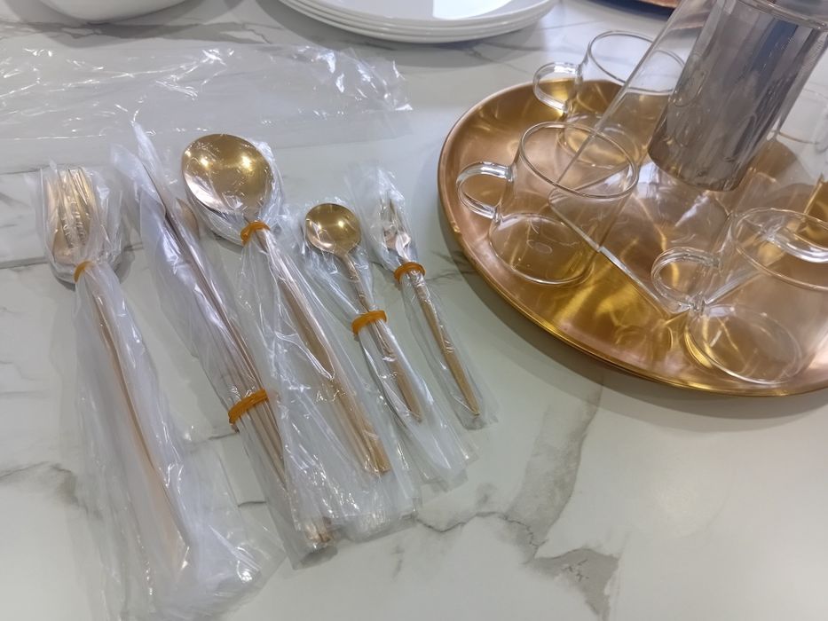Jogo de talheres  douradas