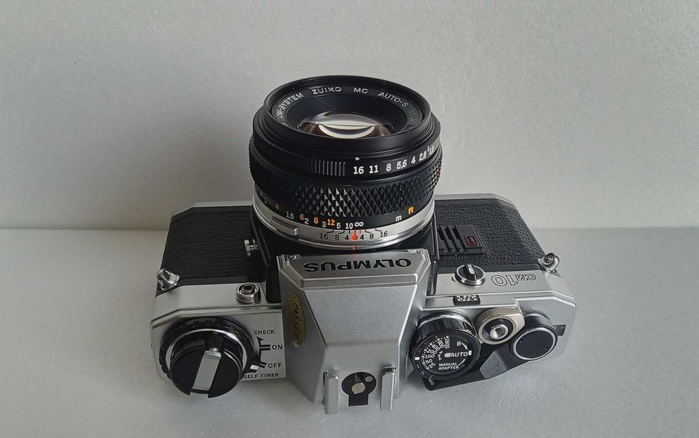 Плівковий фотапарат Olympus OM-10 50mm 1.8