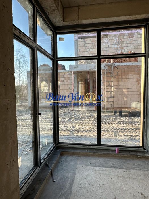 Продажа современного дома в  селе Козин с выходом на реку.