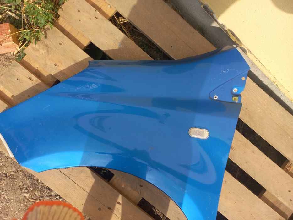 Nissan note e11 błotnik lewy przód przedni