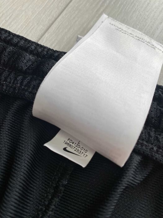 NIKE r.L oryginalne spodnie sportowe stan BDB