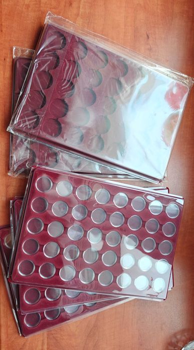 Palet na monety, plus kapsle, plus osłonki na palety.