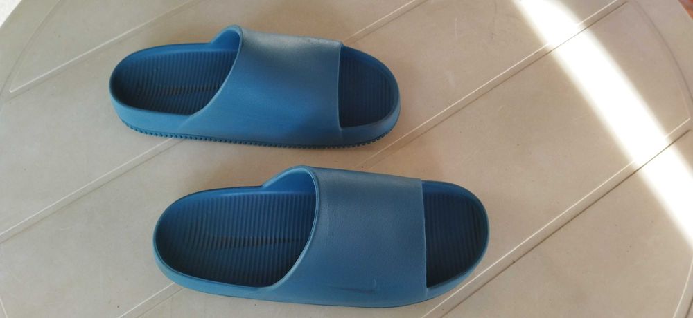 Chinelos Nike Calm Slide azuis
