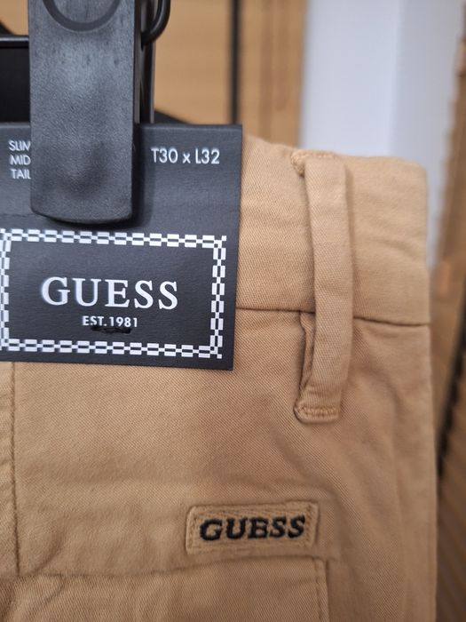 Guess, męskie spodnie chinosy, r. 30/32