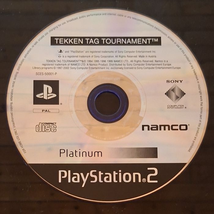PlayStation 2 Slim + 2 Jogos