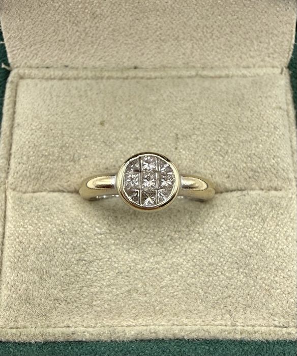 Złoty pierścionek 750 z diamentami 0,34ct VS1/H