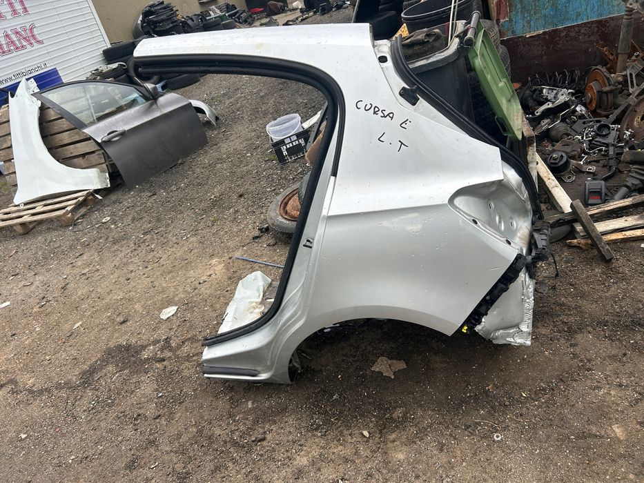 opel corsa e 5 drzwi błotnik tylny lewy