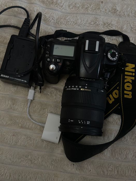Nikon D90 + Sigma 18–200 + adapter do telefonu
