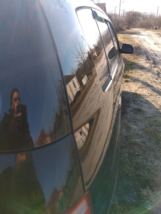 Автомобіль KIA Carens