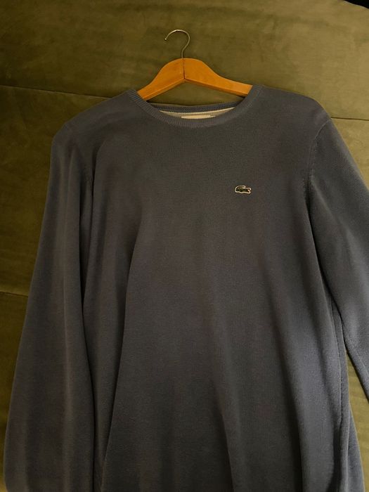 Malhas e casacos de marca