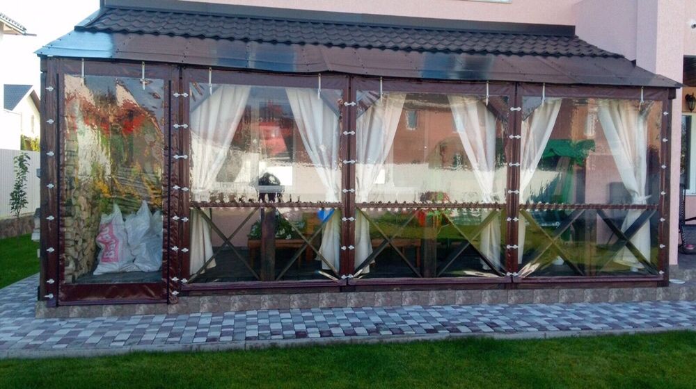 Прозрачные шторы из пленки Одесса от ветра , дождя, снега.