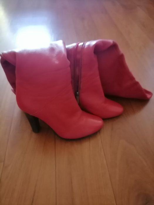 Шкіряні ботфорти .