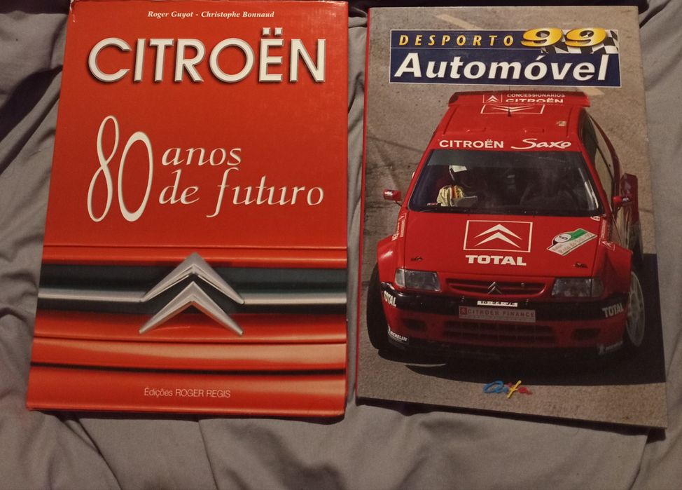 2 livros de automóveis.