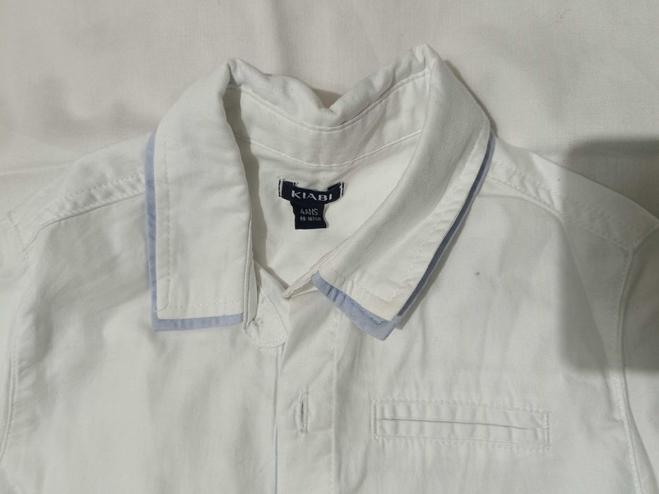 Camisa quase Nova, 4 anos