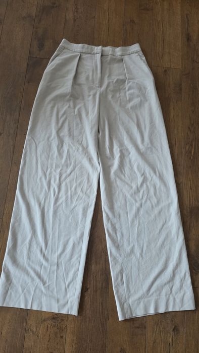 Spodnie eleganckie szeroka nogawka beżowe H&M
