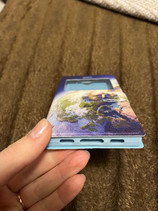 Універсальний чохол для мобільного телефону