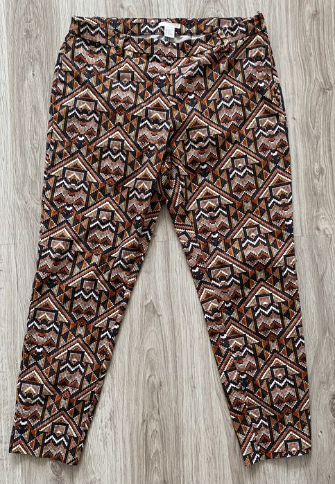 Wzorzyste spodnie H&M aztecki wzór brąz pomarańcz 42 xl jak nowe
