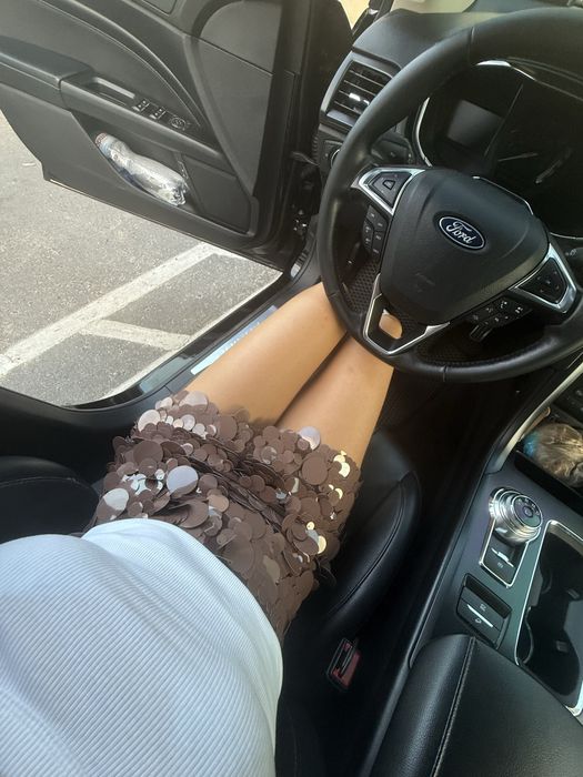 Міні юбка в пайетках