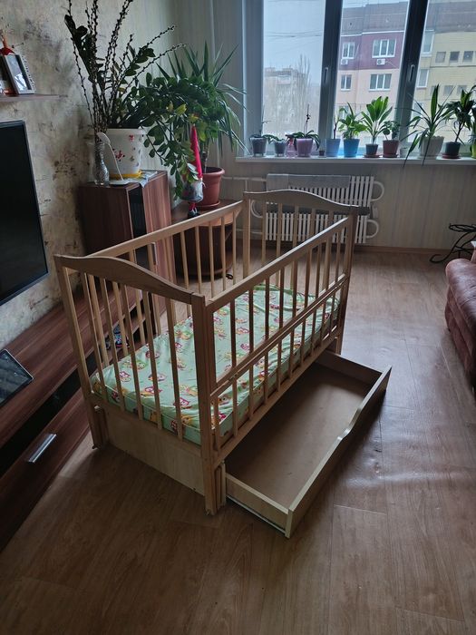 Детская кроватка маятник