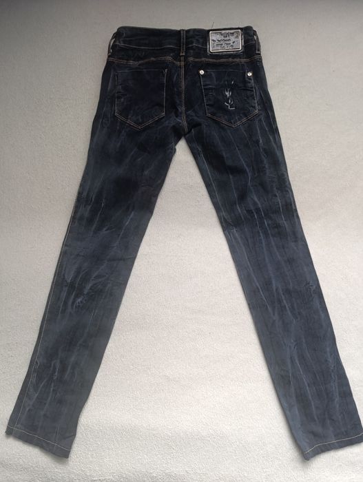 Джинси Yves Saint Laurent