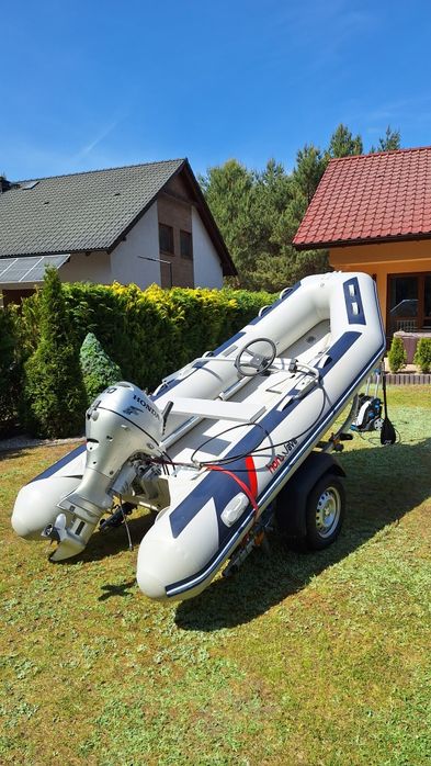 Ponton Honda z przyczepą i silnikiem 20hp