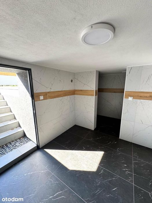 Nowoczesny dom z garażem w Białogonie 149 m2