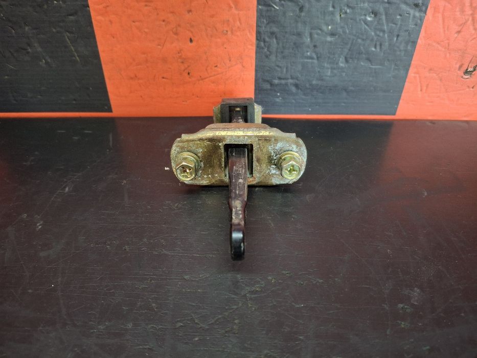 Esticador / limitador porta trás direito MITSUBISHI Pajero Sport I (K7