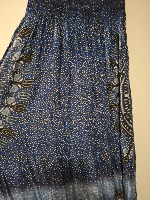 Vestido comprido ombro a ombro 
Elástico no tronco
Tamanho único