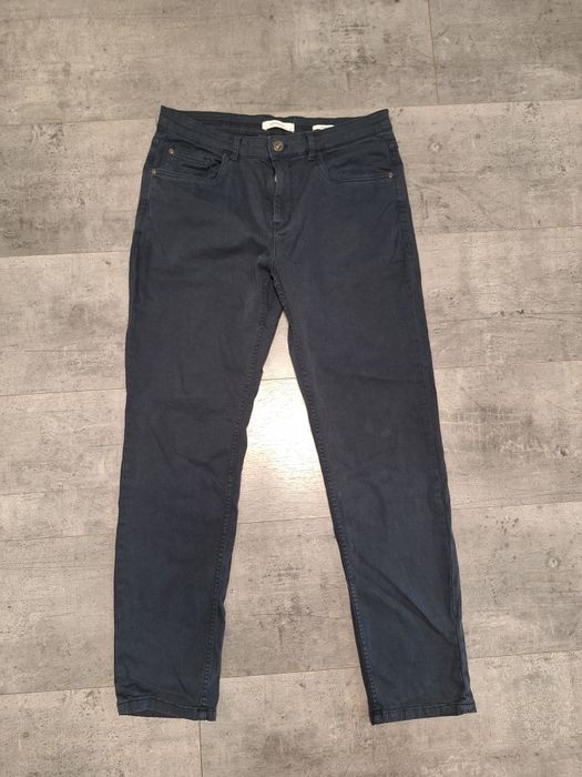 Męskie spodnie Reserved rozm. 32