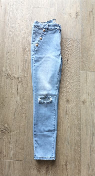 Spodnie jeansowe damskie z ozdobnymi guzikami rozm.XL