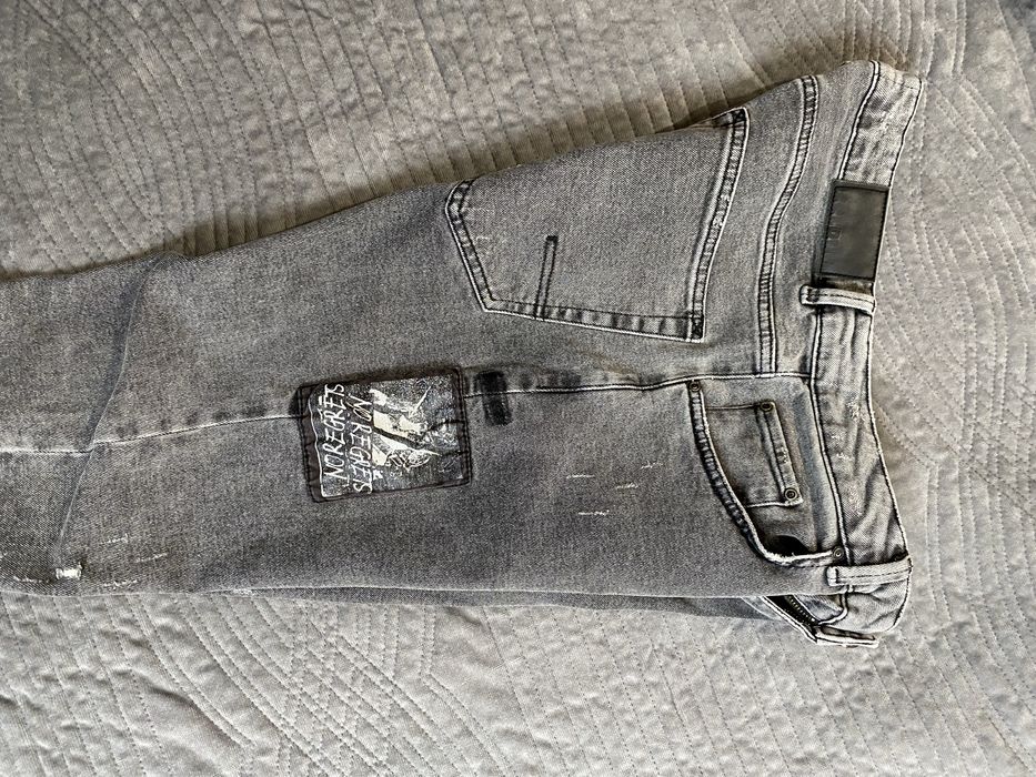 Szare jeansy Reserved