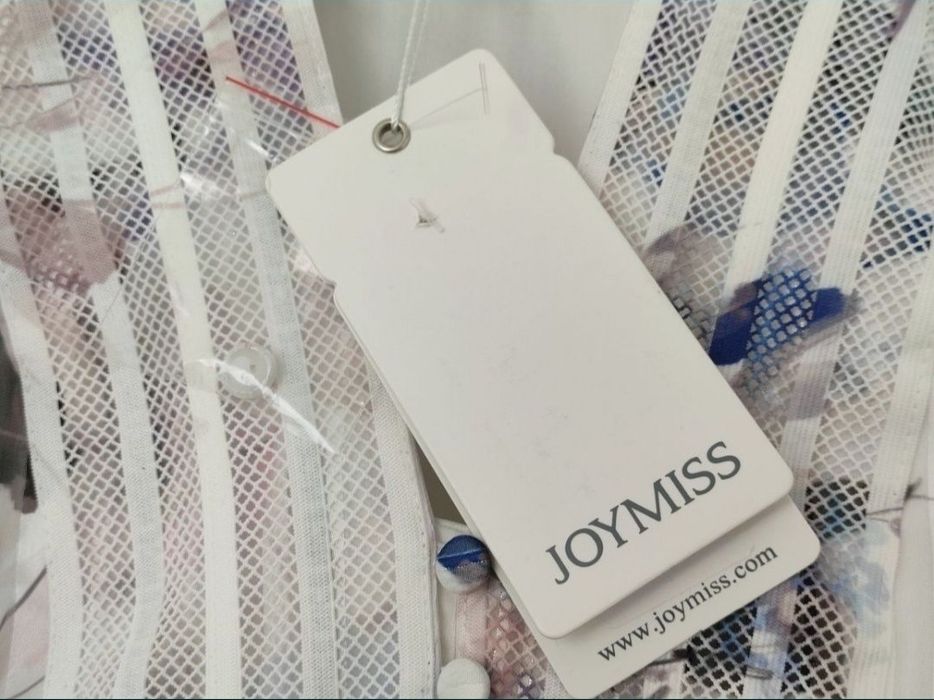 Sukienka biała z kwiatami marki Joy Miss, rozmiar 36. Z boku zamek.