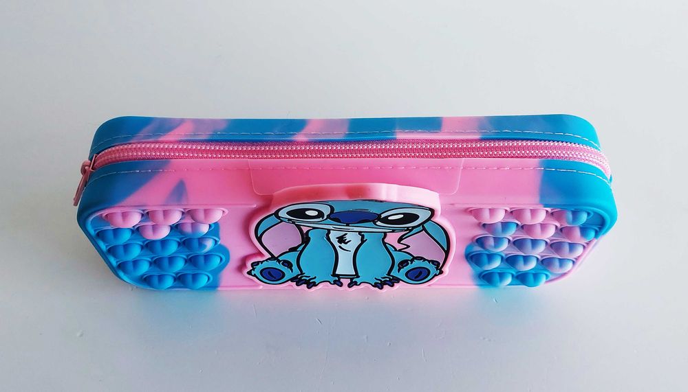 Estojo com bolhas sensoriais pop it do Stitch