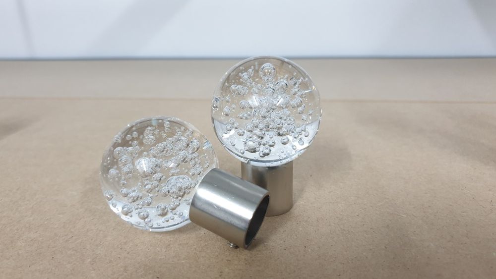 Pontas de varão para cortinados