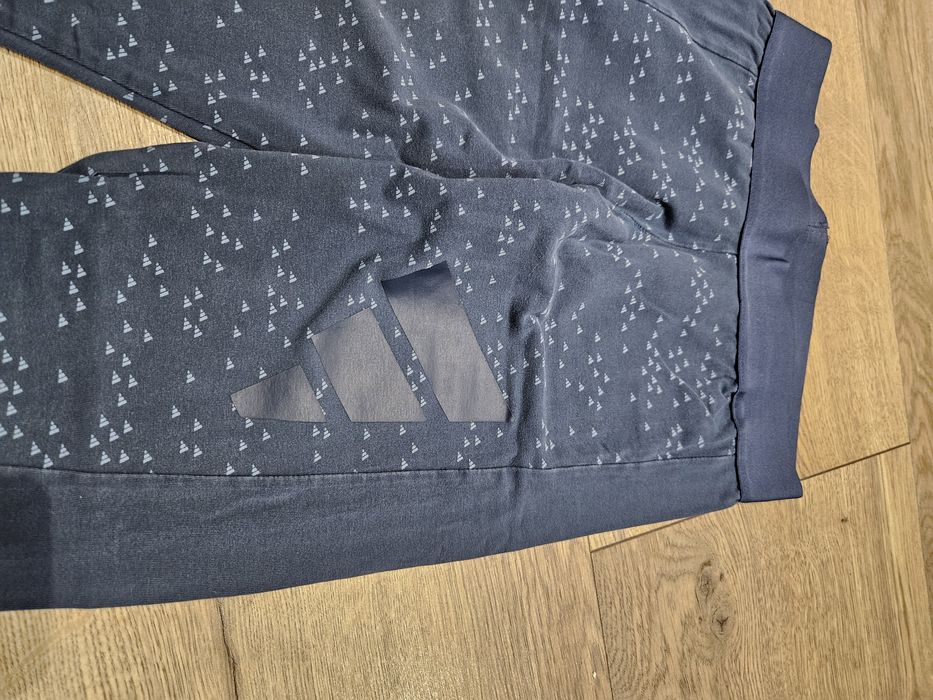 Granatowe legginsy Adidas