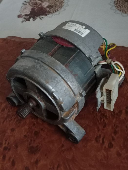 Двигатель к стиральной машине.