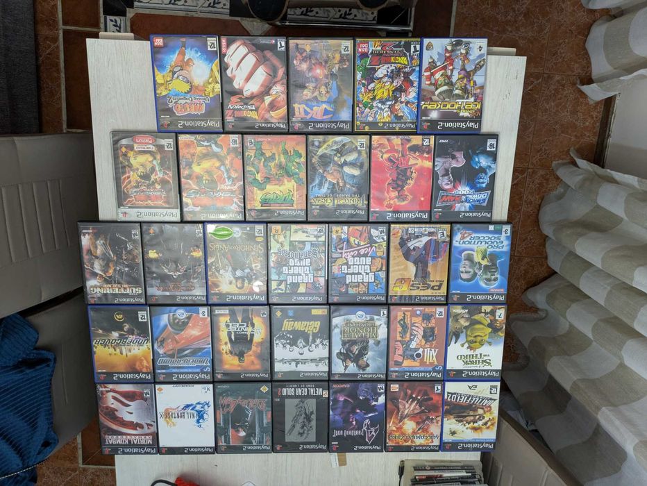 4 malas +capa chuva + escada d alumínio + comandos jogo PS 2