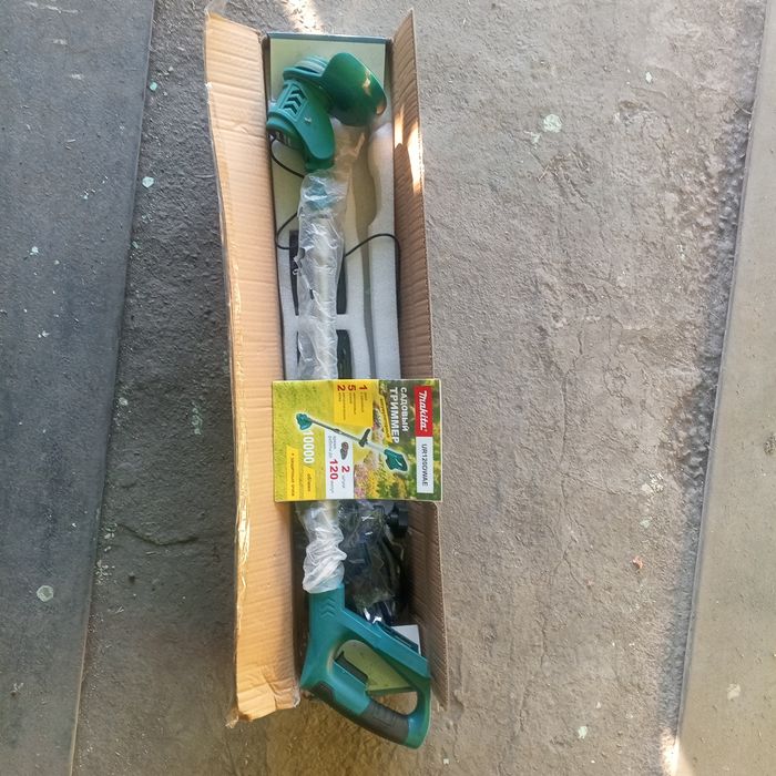 Продам садовый триммер Makita