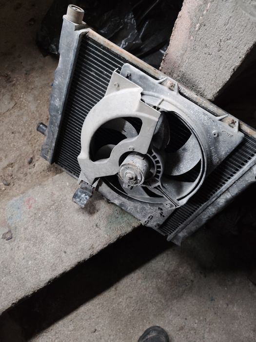 Radiador com ventoinha golf 4